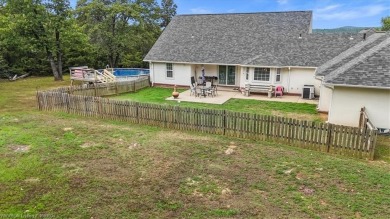 A gorgeous, cozy 2,236 sqft 3-bedroom, 2.5 Bath home sits on 1 on Wolf Ridge Golf Course in Oklahoma - for sale on GolfHomes.com, golf home, golf lot