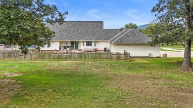 A gorgeous, cozy 2,236 sqft 3-bedroom, 2.5 Bath home sits on 1 on Wolf Ridge Golf Course in Oklahoma - for sale on GolfHomes.com, golf home, golf lot