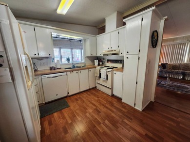 PERFECT home for the active lifestyle! Welcome to this well on Grasslands Golf and Country Club in Florida - for sale on GolfHomes.com, golf home, golf lot