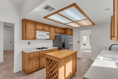 Charming two-bedroom, two-bath home in the guard-gated lake on La Quinta Golf  Resort and Country Clubs in California - for sale on GolfHomes.com, golf home, golf lot