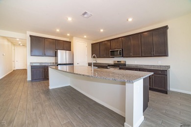 Experience luxury desert living in this stunning 4-bedroom on Las Barrancas Golf Course in Arizona - for sale on GolfHomes.com, golf home, golf lot