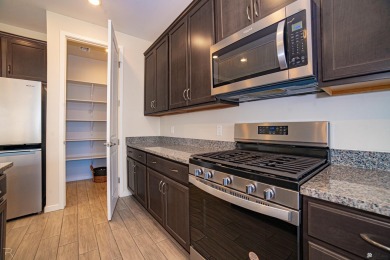 Experience luxury desert living in this stunning 4-bedroom on Las Barrancas Golf Course in Arizona - for sale on GolfHomes.com, golf home, golf lot