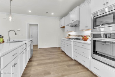 Welcome to 4275 Cobleskill Drive, a refined, move-in-ready on Cape Fear National At Brunswick Forest in North Carolina - for sale on GolfHomes.com, golf home, golf lot