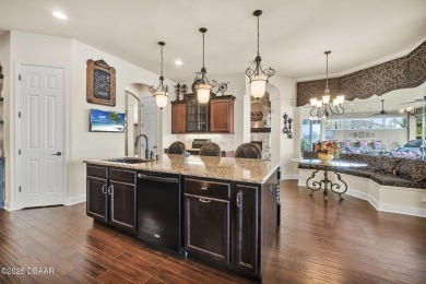 Welcome to 568 Luna Bella Lane, a luxurious lakefront estate on Venetian Bay Golf Course in Florida - for sale on GolfHomes.com, golf home, golf lot
