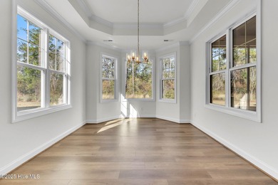 Welcome to 4275 Cobleskill Drive, a refined, move-in-ready on Cape Fear National At Brunswick Forest in North Carolina - for sale on GolfHomes.com, golf home, golf lot