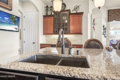 Welcome to 568 Luna Bella Lane, a luxurious lakefront estate on Venetian Bay Golf Course in Florida - for sale on GolfHomes.com, golf home, golf lot
