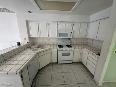 Awesome two-bedroom townhome in guard gated golf course on Painted Desert Golf Club in Nevada - for sale on GolfHomes.com, golf home, golf lot