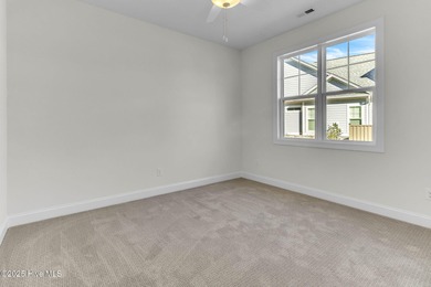 Welcome to 4275 Cobleskill Drive, a refined, move-in-ready on Cape Fear National At Brunswick Forest in North Carolina - for sale on GolfHomes.com, golf home, golf lot