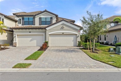 Discover the epitome of luxury living in this meticulously on Lakewood National Golf Club in Florida - for sale on GolfHomes.com, golf home, golf lot