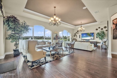 Welcome to 568 Luna Bella Lane, a luxurious lakefront estate on Venetian Bay Golf Course in Florida - for sale on GolfHomes.com, golf home, golf lot