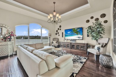 Welcome to 568 Luna Bella Lane, a luxurious lakefront estate on Venetian Bay Golf Course in Florida - for sale on GolfHomes.com, golf home, golf lot