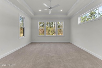 Welcome to 4275 Cobleskill Drive, a refined, move-in-ready on Cape Fear National At Brunswick Forest in North Carolina - for sale on GolfHomes.com, golf home, golf lot