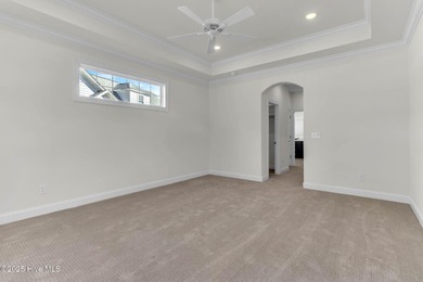 Welcome to 4275 Cobleskill Drive, a refined, move-in-ready on Cape Fear National At Brunswick Forest in North Carolina - for sale on GolfHomes.com, golf home, golf lot