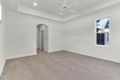 Welcome to 4275 Cobleskill Drive, a refined, move-in-ready on Cape Fear National At Brunswick Forest in North Carolina - for sale on GolfHomes.com, golf home, golf lot