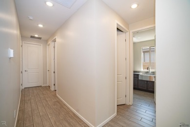 Experience luxury desert living in this stunning 4-bedroom on Las Barrancas Golf Course in Arizona - for sale on GolfHomes.com, golf home, golf lot