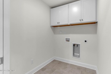 Welcome to 4275 Cobleskill Drive, a refined, move-in-ready on Cape Fear National At Brunswick Forest in North Carolina - for sale on GolfHomes.com, golf home, golf lot