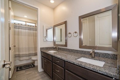 Experience luxury desert living in this stunning 4-bedroom on Las Barrancas Golf Course in Arizona - for sale on GolfHomes.com, golf home, golf lot