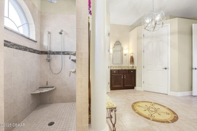 Welcome to 568 Luna Bella Lane, a luxurious lakefront estate on Venetian Bay Golf Course in Florida - for sale on GolfHomes.com, golf home, golf lot