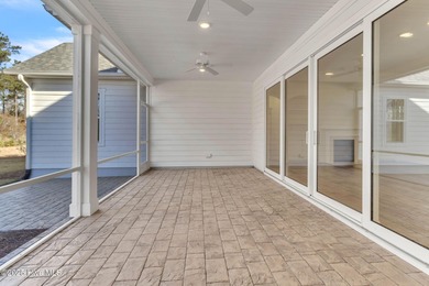 Welcome to 4275 Cobleskill Drive, a refined, move-in-ready on Cape Fear National At Brunswick Forest in North Carolina - for sale on GolfHomes.com, golf home, golf lot
