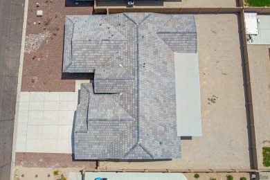 Experience luxury desert living in this stunning 4-bedroom on Las Barrancas Golf Course in Arizona - for sale on GolfHomes.com, golf home, golf lot