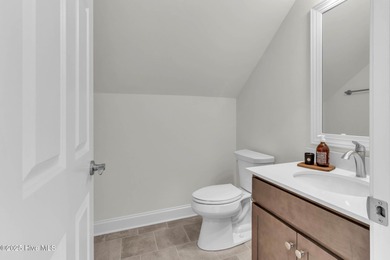 Welcome to 4275 Cobleskill Drive, a refined, move-in-ready on Cape Fear National At Brunswick Forest in North Carolina - for sale on GolfHomes.com, golf home, golf lot