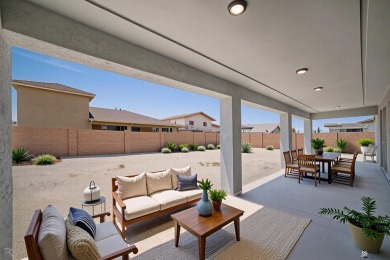 Experience luxury desert living in this stunning 4-bedroom on Las Barrancas Golf Course in Arizona - for sale on GolfHomes.com, golf home, golf lot