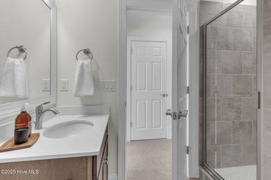 Welcome to 4275 Cobleskill Drive, a refined, move-in-ready on Cape Fear National At Brunswick Forest in North Carolina - for sale on GolfHomes.com, golf home, golf lot