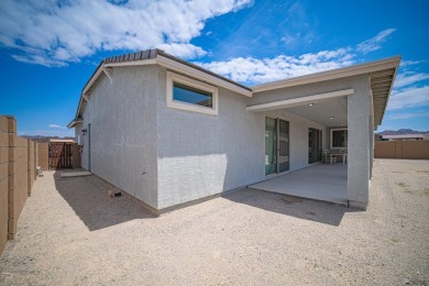 Experience luxury desert living in this stunning 4-bedroom on Las Barrancas Golf Course in Arizona - for sale on GolfHomes.com, golf home, golf lot