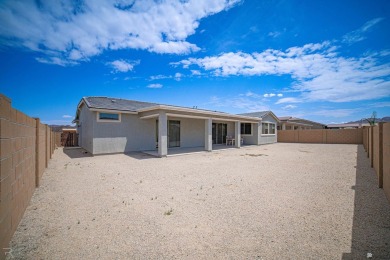 Experience luxury desert living in this stunning 4-bedroom on Las Barrancas Golf Course in Arizona - for sale on GolfHomes.com, golf home, golf lot