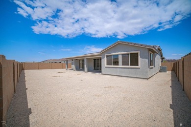 Experience luxury desert living in this stunning 4-bedroom on Las Barrancas Golf Course in Arizona - for sale on GolfHomes.com, golf home, golf lot
