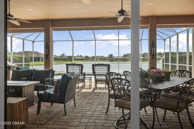 Welcome to 568 Luna Bella Lane, a luxurious lakefront estate on Venetian Bay Golf Course in Florida - for sale on GolfHomes.com, golf home, golf lot