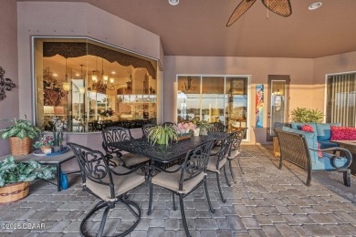 Welcome to 568 Luna Bella Lane, a luxurious lakefront estate on Venetian Bay Golf Course in Florida - for sale on GolfHomes.com, golf home, golf lot