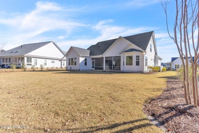 Welcome to 4275 Cobleskill Drive, a refined, move-in-ready on Cape Fear National At Brunswick Forest in North Carolina - for sale on GolfHomes.com, golf home, golf lot