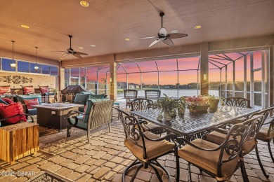 Welcome to 568 Luna Bella Lane, a luxurious lakefront estate on Venetian Bay Golf Course in Florida - for sale on GolfHomes.com, golf home, golf lot