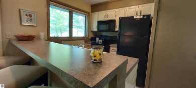 Location and View! Location and View! You would have a hard time on Shanty Creek Golf Course in Michigan - for sale on GolfHomes.com, golf home, golf lot