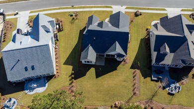 Welcome to 4275 Cobleskill Drive, a refined, move-in-ready on Cape Fear National At Brunswick Forest in North Carolina - for sale on GolfHomes.com, golf home, golf lot