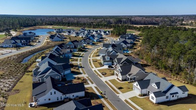 Welcome to 4275 Cobleskill Drive, a refined, move-in-ready on Cape Fear National At Brunswick Forest in North Carolina - for sale on GolfHomes.com, golf home, golf lot