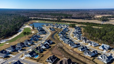 Welcome to 4275 Cobleskill Drive, a refined, move-in-ready on Cape Fear National At Brunswick Forest in North Carolina - for sale on GolfHomes.com, golf home, golf lot