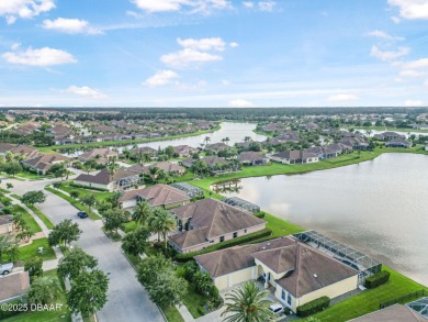 Welcome to 568 Luna Bella Lane, a luxurious lakefront estate on Venetian Bay Golf Course in Florida - for sale on GolfHomes.com, golf home, golf lot