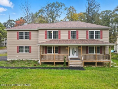 Forget the stress of building--this exceptional 2021 Colonial is on Pocono Farms Country Club in Pennsylvania - for sale on GolfHomes.com, golf home, golf lot