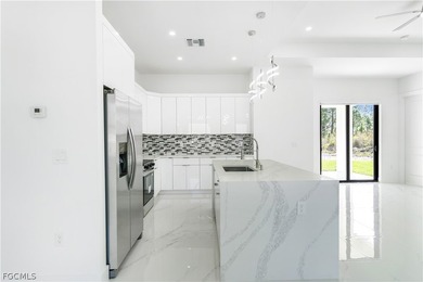 Move-in ready new construction home in fast-growing Leigh Acres on Lehigh Resort Club in Florida - for sale on GolfHomes.com, golf home, golf lot