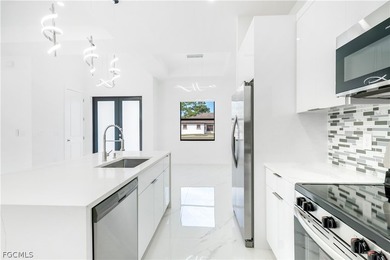 Move-in ready new construction home in fast-growing Leigh Acres on Lehigh Resort Club in Florida - for sale on GolfHomes.com, golf home, golf lot