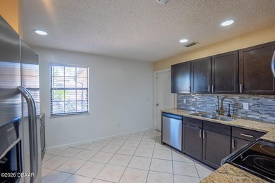 Spacious open plan and ready to move in home. This home is much on The Grand Club - Pine Lakes Course in Florida - for sale on GolfHomes.com, golf home, golf lot