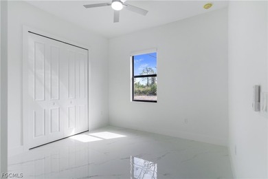 Move-in ready new construction home in fast-growing Leigh Acres on Lehigh Resort Club in Florida - for sale on GolfHomes.com, golf home, golf lot