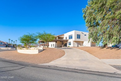 This is more than a remodel--it's a one-of-a-kind architectural on London Bridge Golf Course in Arizona - for sale on GolfHomes.com, golf home, golf lot