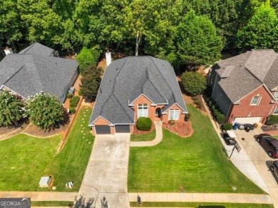 Welcome to this charming STEPLESS BRICK RANCH perfectly on Trophy Club of Apalachee in Georgia - for sale on GolfHomes.com, golf home, golf lot