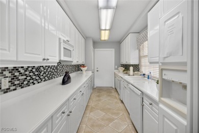 Experience elegant waterfront living in the exclusive Palmas del on Gulf Harbour Yacht and Country Club in Florida - for sale on GolfHomes.com, golf home, golf lot