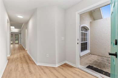 Enjoy easy, maintenance-free living in this beautifully restored on Turkey Creek Golf and Country Club in Florida - for sale on GolfHomes.com, golf home, golf lot