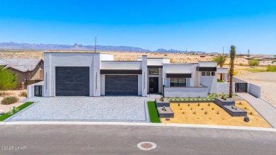 Located at 2446 E La Mancha in the prestigious gated community on Los Lagos Golf Club in Arizona - for sale on GolfHomes.com, golf home, golf lot