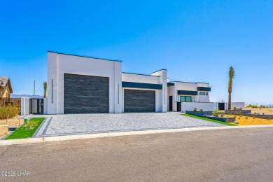 Located at 2446 E La Mancha in the prestigious gated community on Los Lagos Golf Club in Arizona - for sale on GolfHomes.com, golf home, golf lot